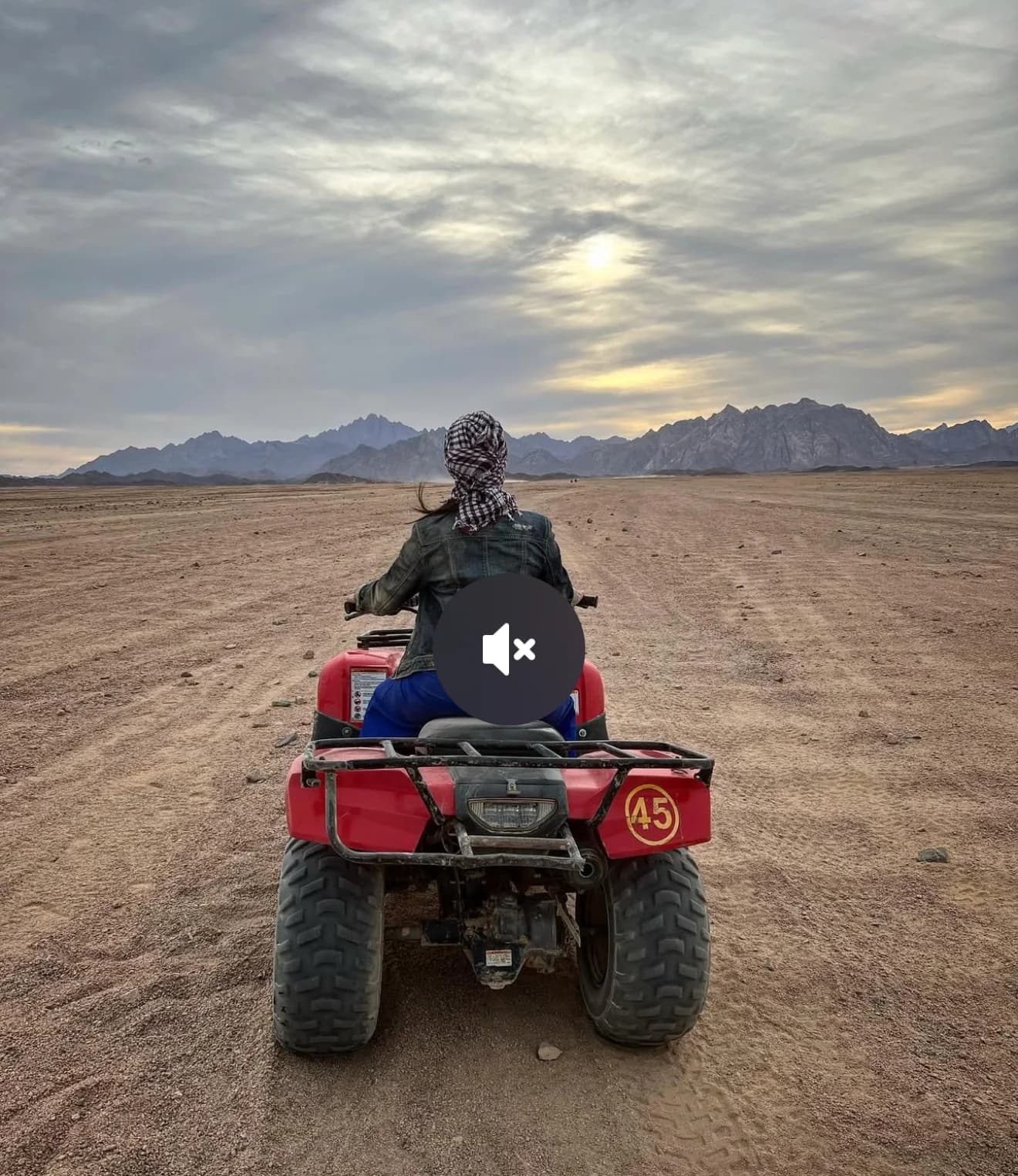Quad-bike tour photograph with golden desert light