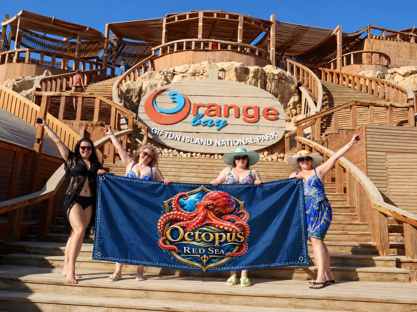 Client-supplied Red Sea holiday promotional photo with digitally added Octopus flag
