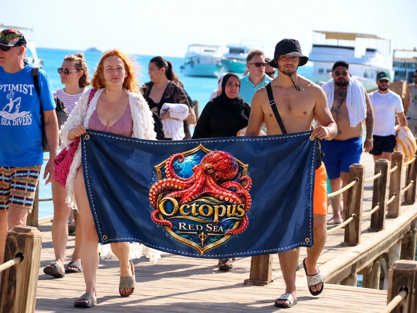 Client-supplied Red Sea holiday promotional photo with digitally added Octopus flag