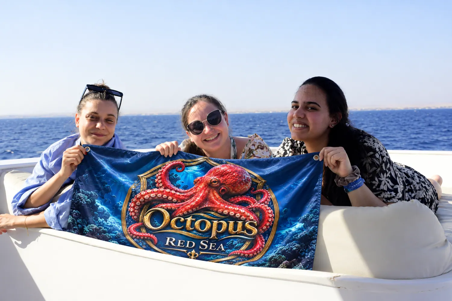 Client-supplied Red Sea holiday promotional photo with digitally added Octopus flag