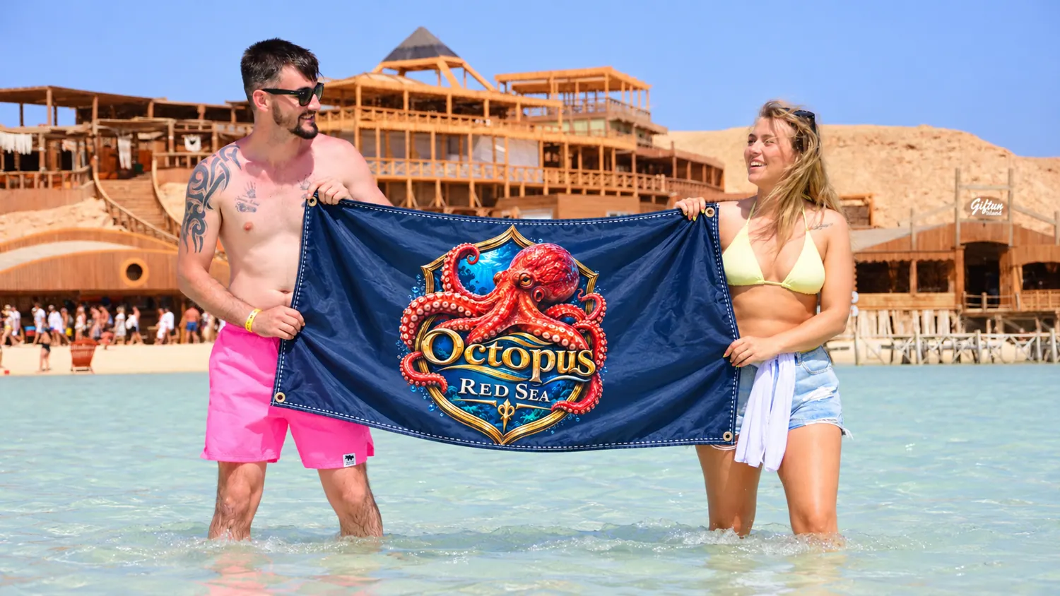 Client-supplied Red Sea holiday promotional photo with digitally added Octopus flag