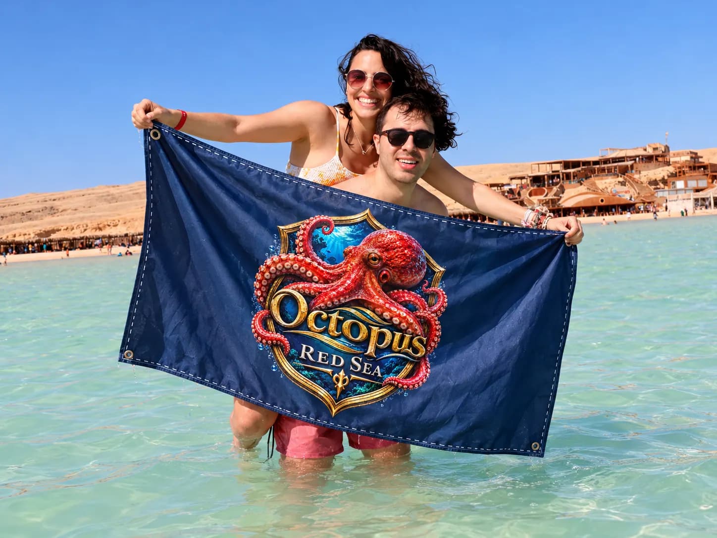 Client-supplied Red Sea holiday promotional photo with digitally added Octopus flag