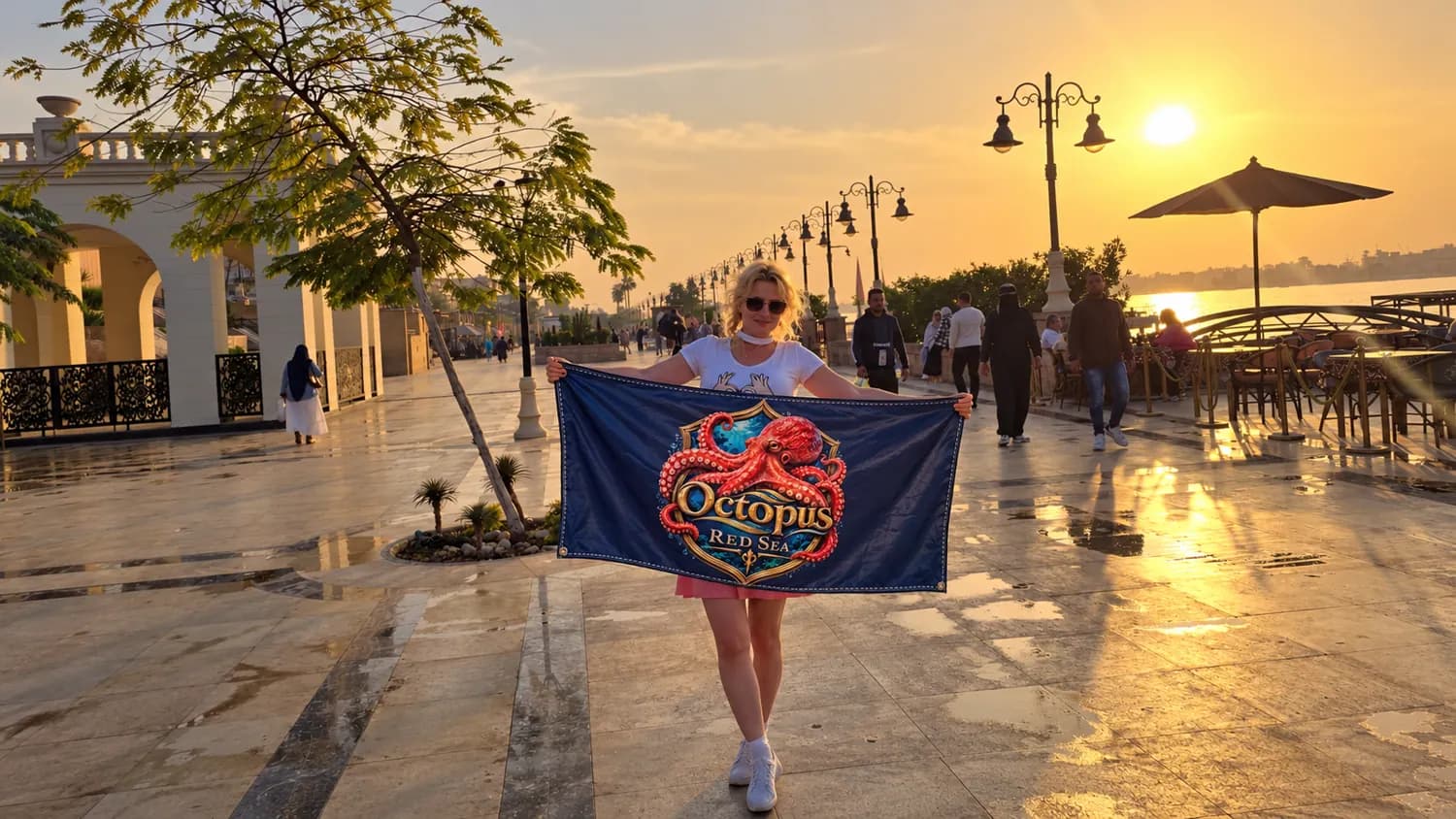 Client-supplied Red Sea holiday promotional photo with digitally added Octopus flag