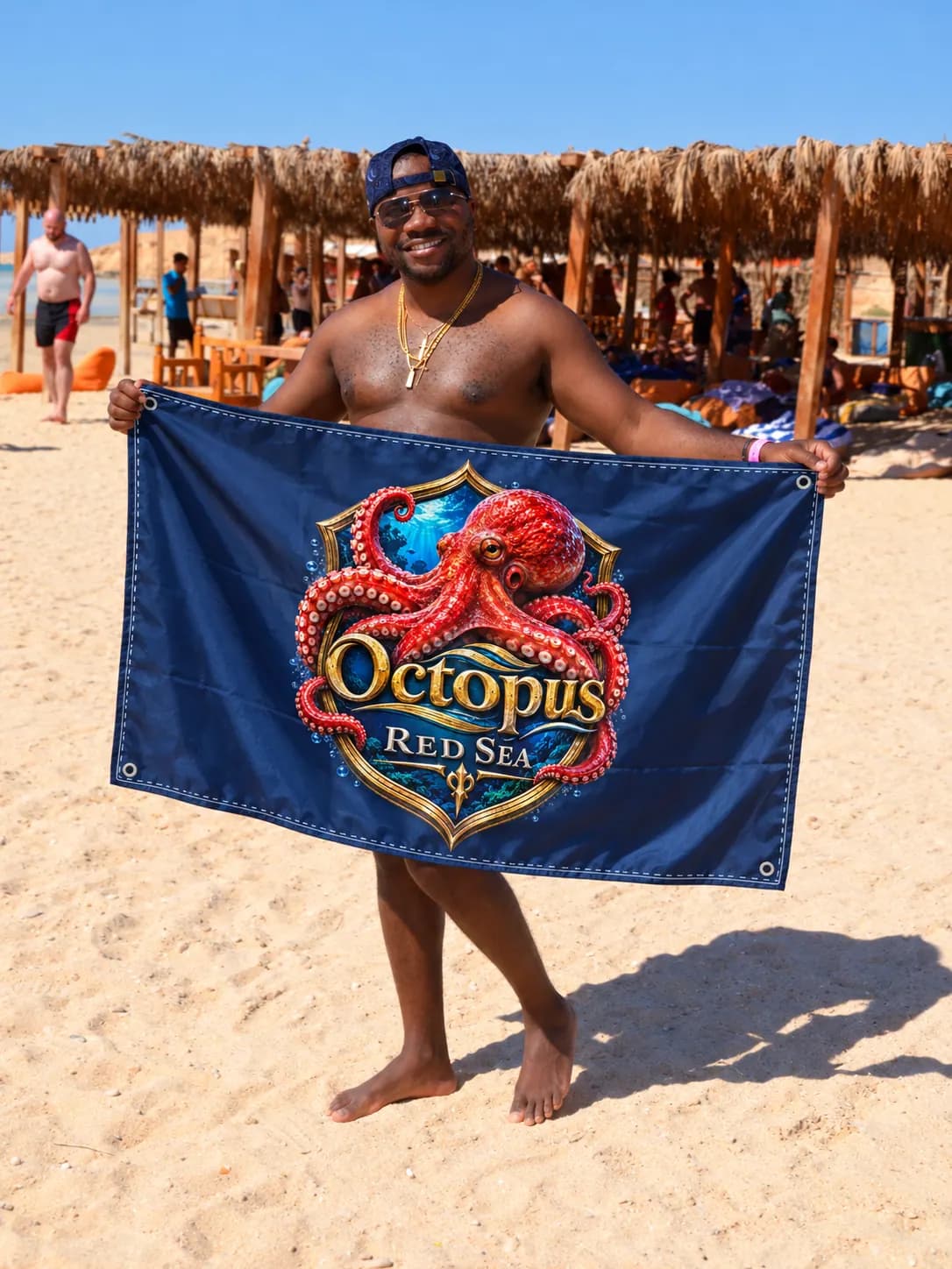 Client-supplied Red Sea holiday promotional photo with digitally added Octopus flag
