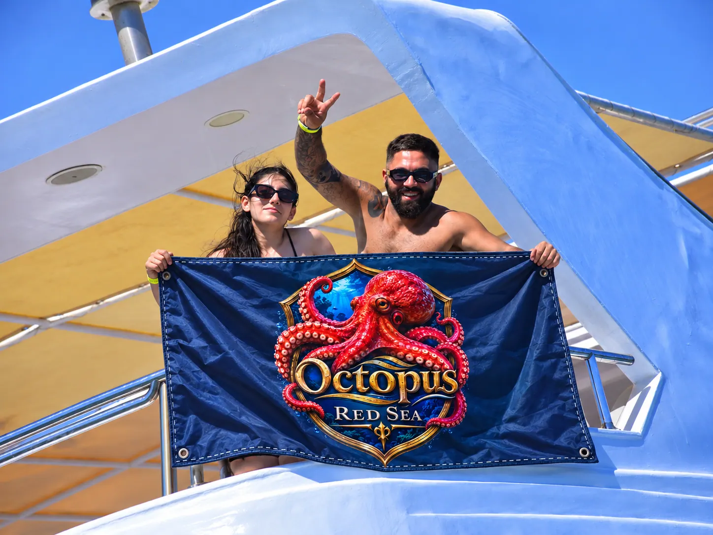 Client-supplied Red Sea holiday promotional photo with digitally added Octopus flag